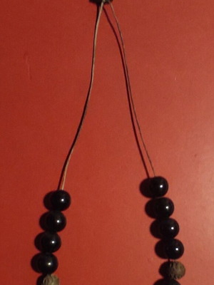 Komboloi with 17 obsidian beads like new