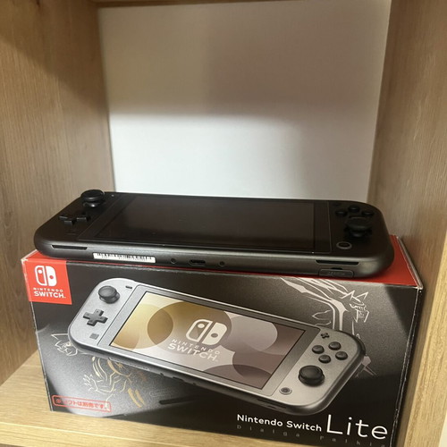 Nintendo Switch Lite Palkia Dialga like new with accessories and 2 protective cases