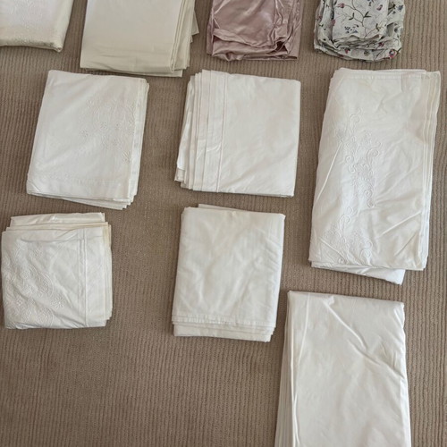 Set of embroidered cotton bed sheets, pillowcases and duvet covers