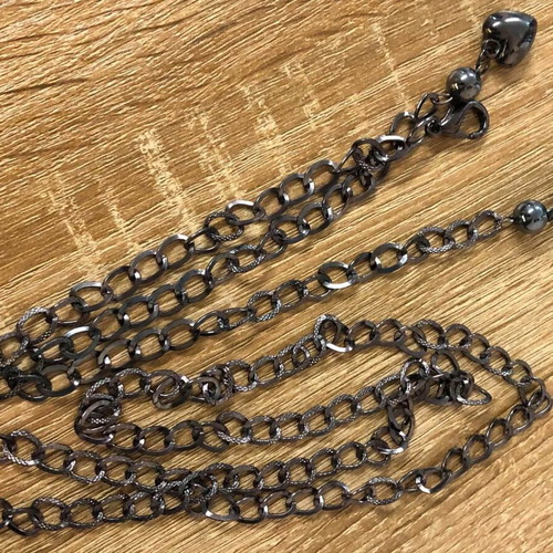 Metal adjustable black belt