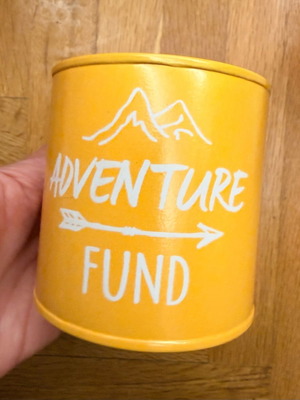 Adventure Fund metal piggy bank yellow new
