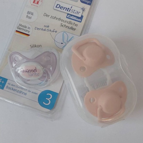 Set of new baby pacifiers and soothers