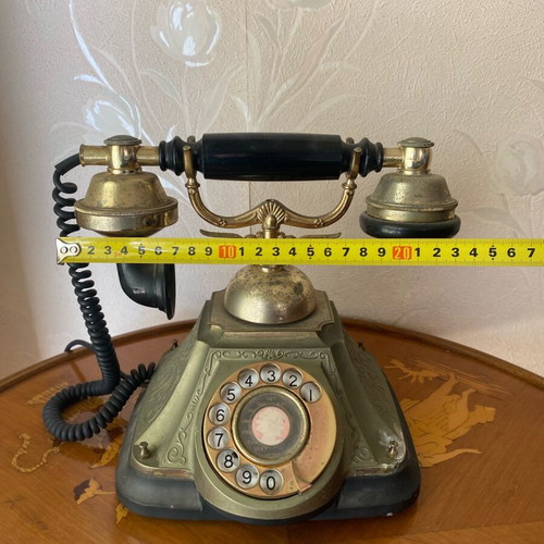 Vintage telephone device used, decorative antique