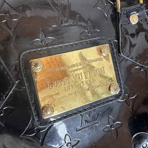 Louis Vuitton old black bag with gold accessories