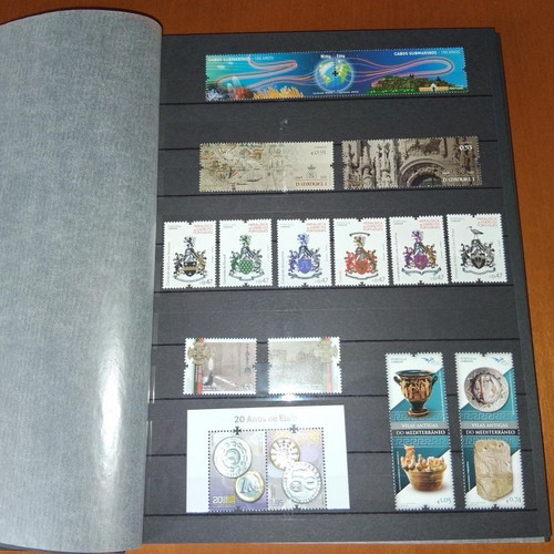 Portuguese stamps and first day covers in 32-page album new