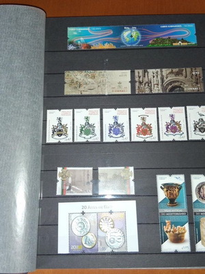 Portuguese stamps and first day covers in 32-page album new