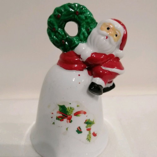 Ceramic bell like new with Santa Claus and wreath
