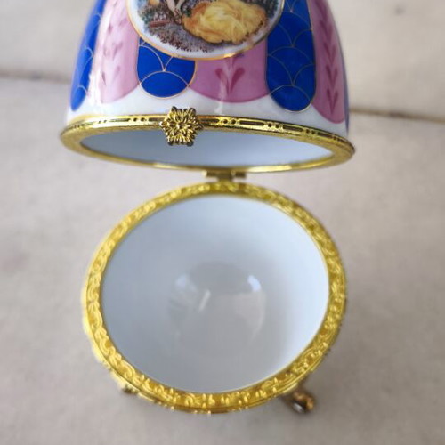 Limoges decorative porcelain egg-shaped box with gold details like new