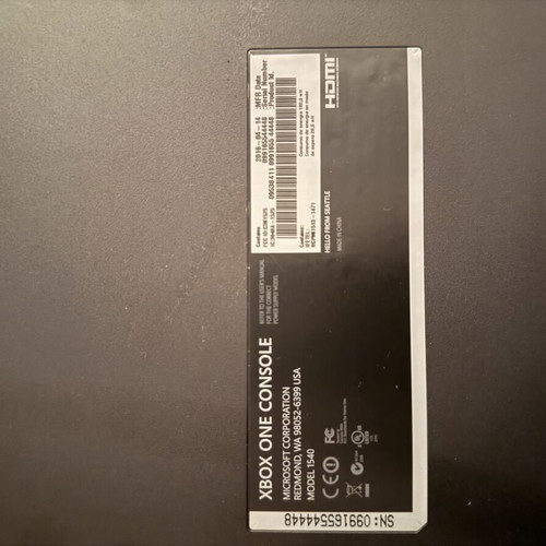 Xbox One Fat 500 GB console with MotoGP 18 game and controller