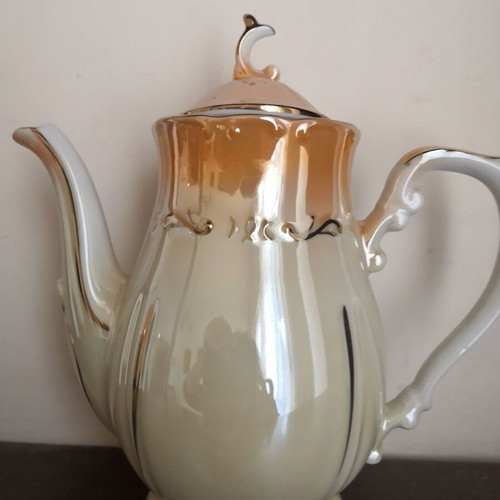 Porcelain teapot with opalescent surface and gold decoration