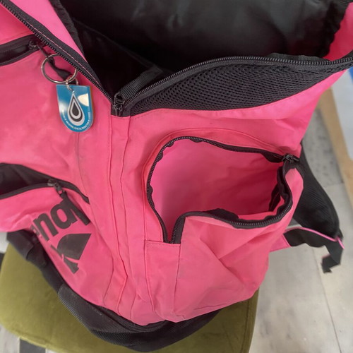 Arena pool bag with compartments used, fuchsia color