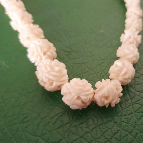 Vintage carved bone necklace with rose details