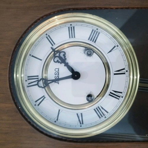 Wooden wind-up pendulum clock used with Asso mechanism