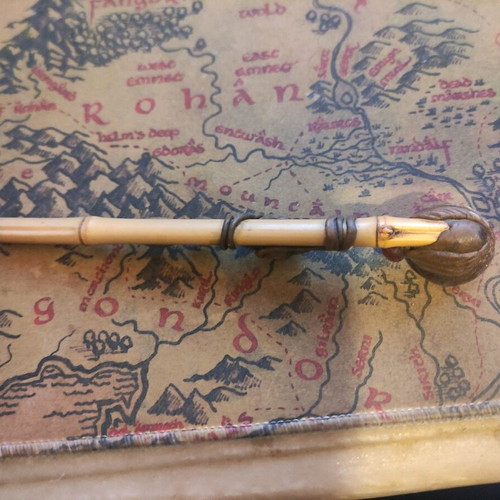 Handmade wooden pipe used with stone and owl decoration