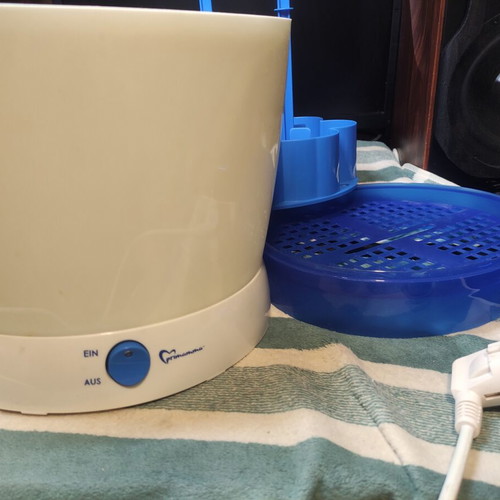 Primamma electric steam sterilizer used, capacity for 9 bottles