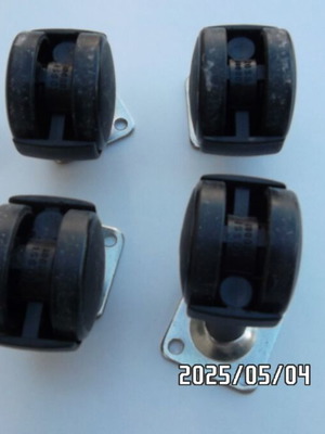 Set of 4 used swivel caster wheels with metal double base