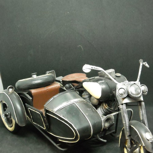 Decorative vintage Harley Davidson type motorcycle with sidecar used