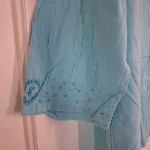 Turquoise tunic used with beads on neck and sleeves, one size