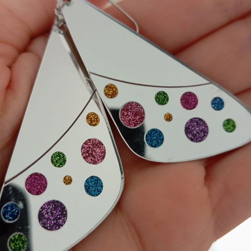 Earrings used, plastic with glitter
