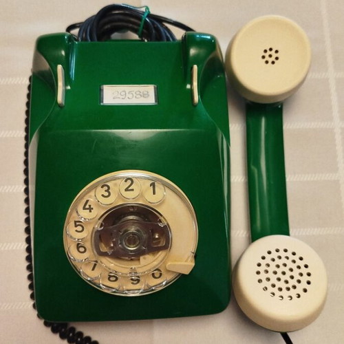 Old green wired telephone, functional
