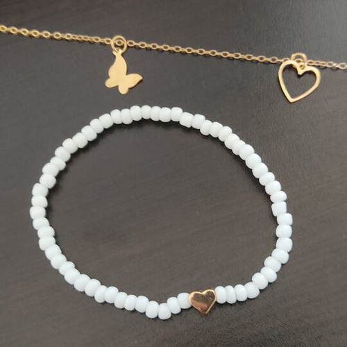 Anklet and white bracelet set like new, gold and white