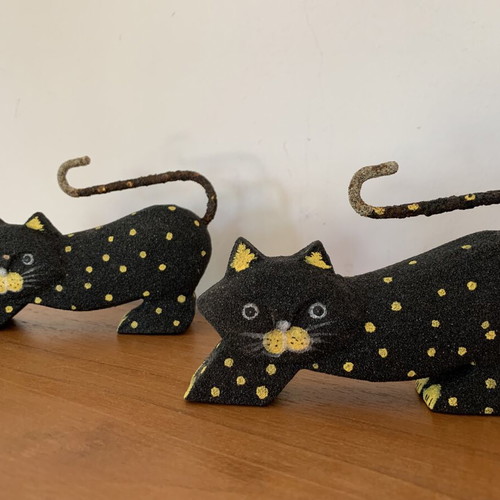 Set of two handmade wooden and sand cat figurines