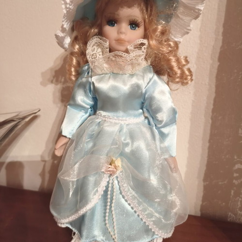 Porcelain doll, decorative, blue or burgundy