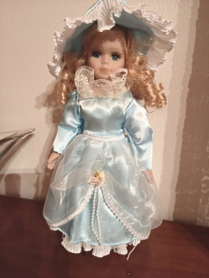 Porcelain doll, decorative, blue or burgundy