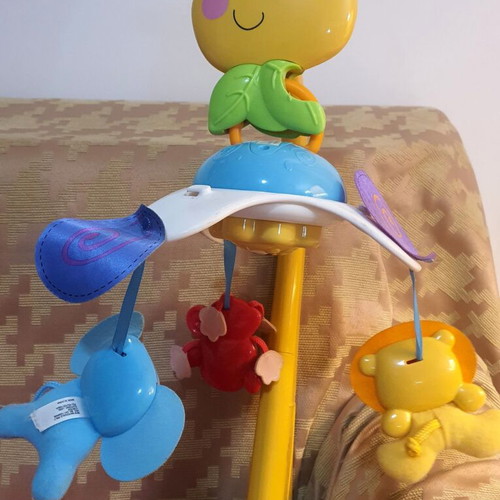 Fisher Price musical rotating mobile used with wind-up mechanism