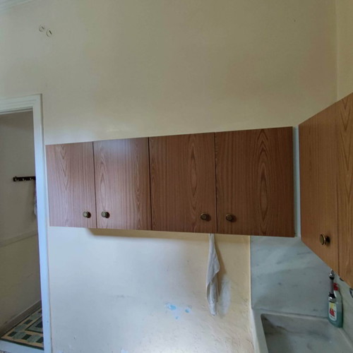 Kitchen cabinets used, two rows made of novopan
