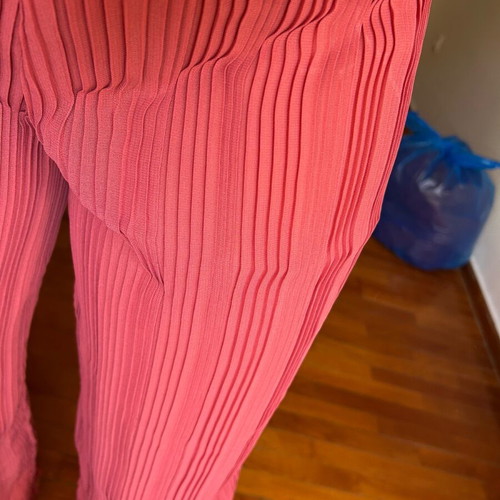 Red pants size M like new made of white fabric