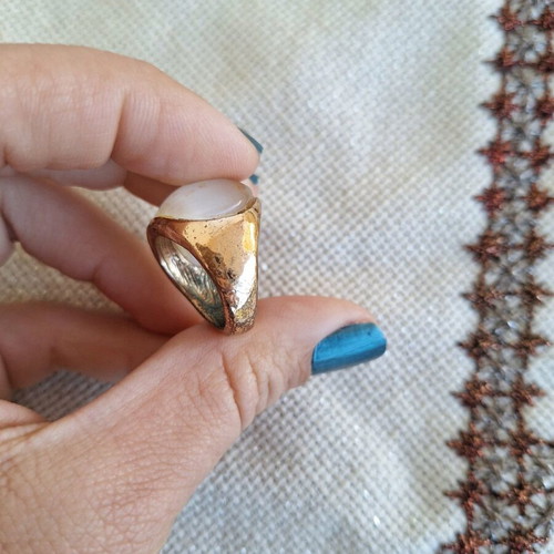 Ring with cat's eye stone size 18 used, metal and stone