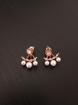 Gold earrings with clear stones and white pearls