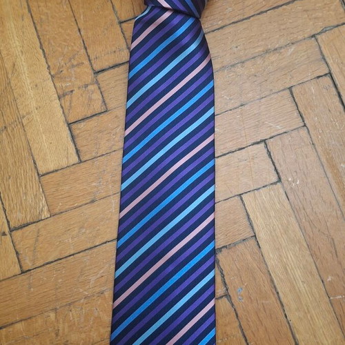 Otomelara tie with diagonal stripes in purple, black, mauve and blue