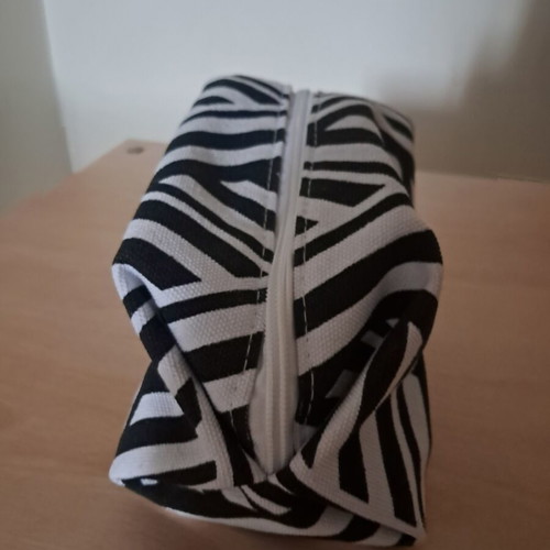 Neutrogena toiletry bag, black and white