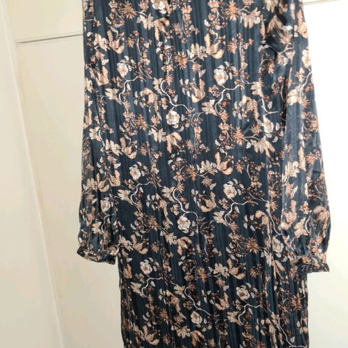 Dress size 38 used, silk pleated with thin lining