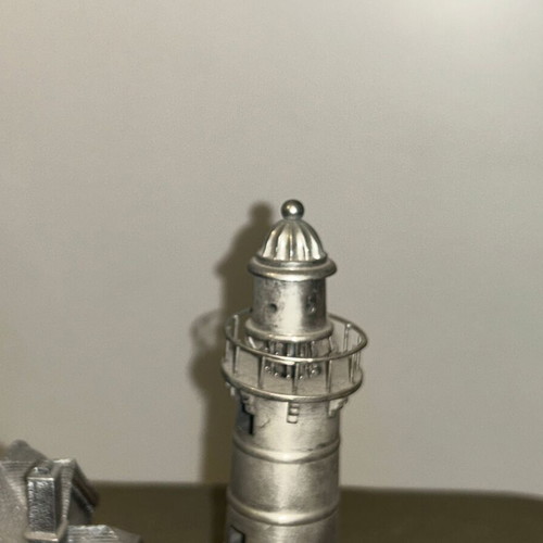 Vintage metal lighthouse decorative miniature with hidden compartment, like new