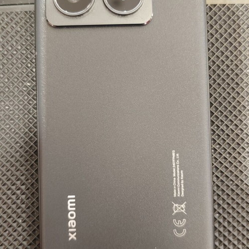 Xiaomi 14T Pro smartphone used with Nilkin case and Xiaomi 67W charger