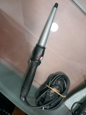 Professional curling iron for thin curls used