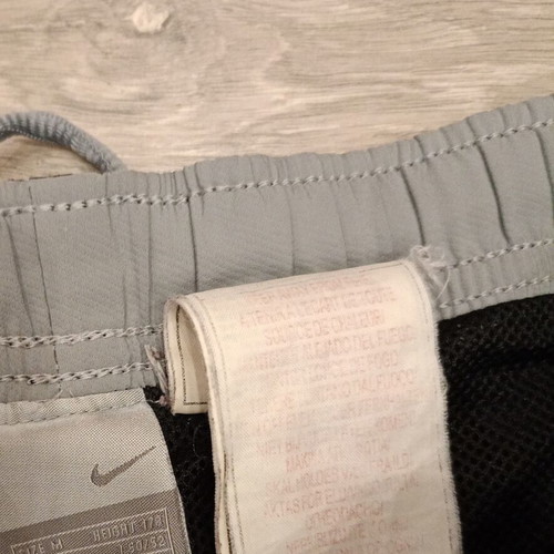 Nike Athletic Y2K Track Pants used, black with red swoosh logo