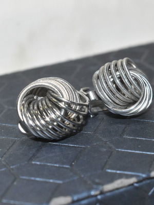 Vintage women's clip-on earrings silver color spiral design used
