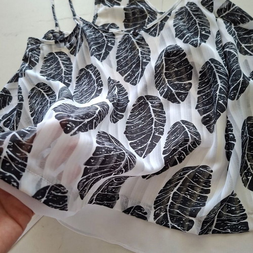 Top with leaf print one size like new, black and white