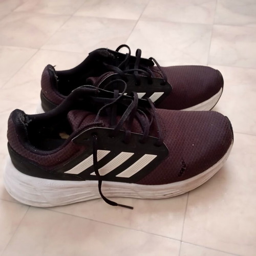 Adidas athletic shoes pair, black, size 45