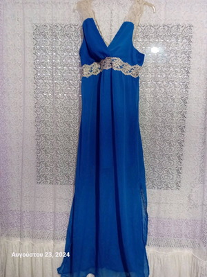 Le Vertige blue dress like new with small snag size M