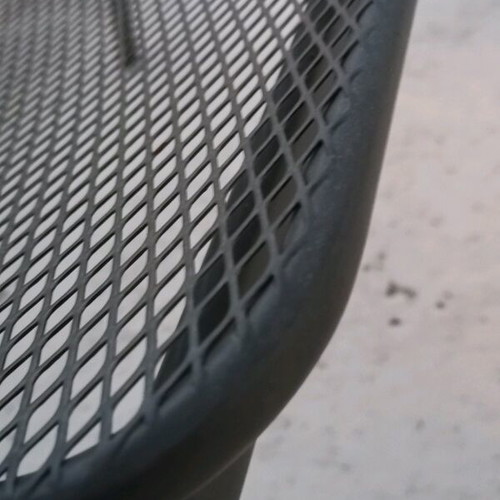 Metal double sofa and glass table used for garden or terrace