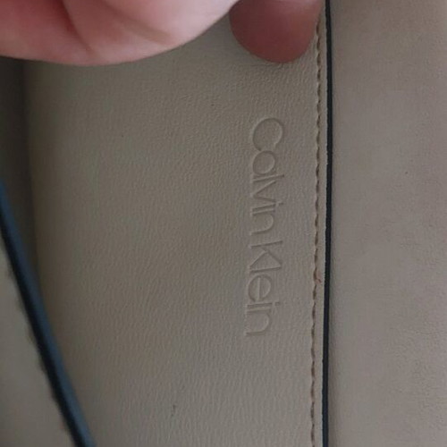 CK shoulder bag made of recycled materials with slight wear