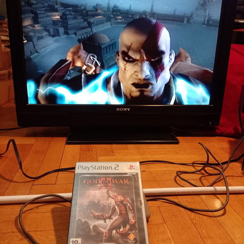 PlayStation 2 (PS2) used with 5 games pack and controller