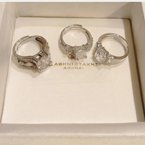Galerie Tsangarakis rings with white sapphires like new, plated silver
