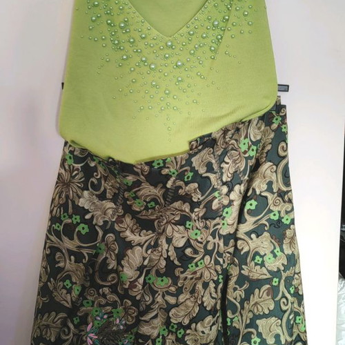 Knitted top used green lime with green pearls, size S