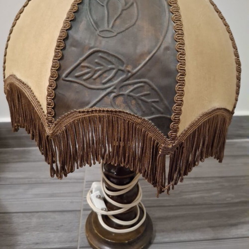 Vintage table lamp with wooden base and embossed fringed shade